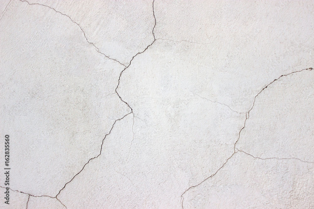 Obraz premium white wall, the surface cracked plaster, concrete texture