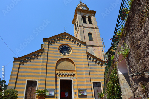 PORTOFINO, ITALY - JUNE 13, 2017: Catholic medieval church of San Martino in Portofino town, Italy photo