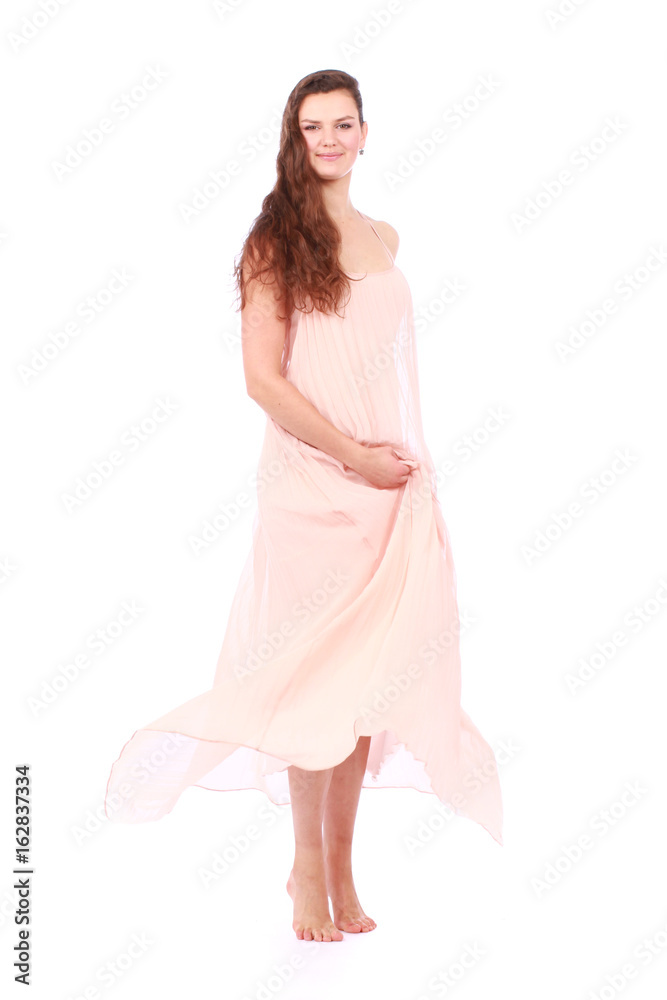 graceful girl in flying light pink dress