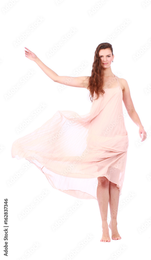 Naklejka premium graceful girl in flying light pink dress