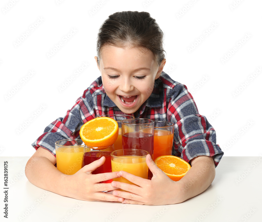 Cute little girl with glasses of different juice on white background Cute little girl with glasses of different juice on white background