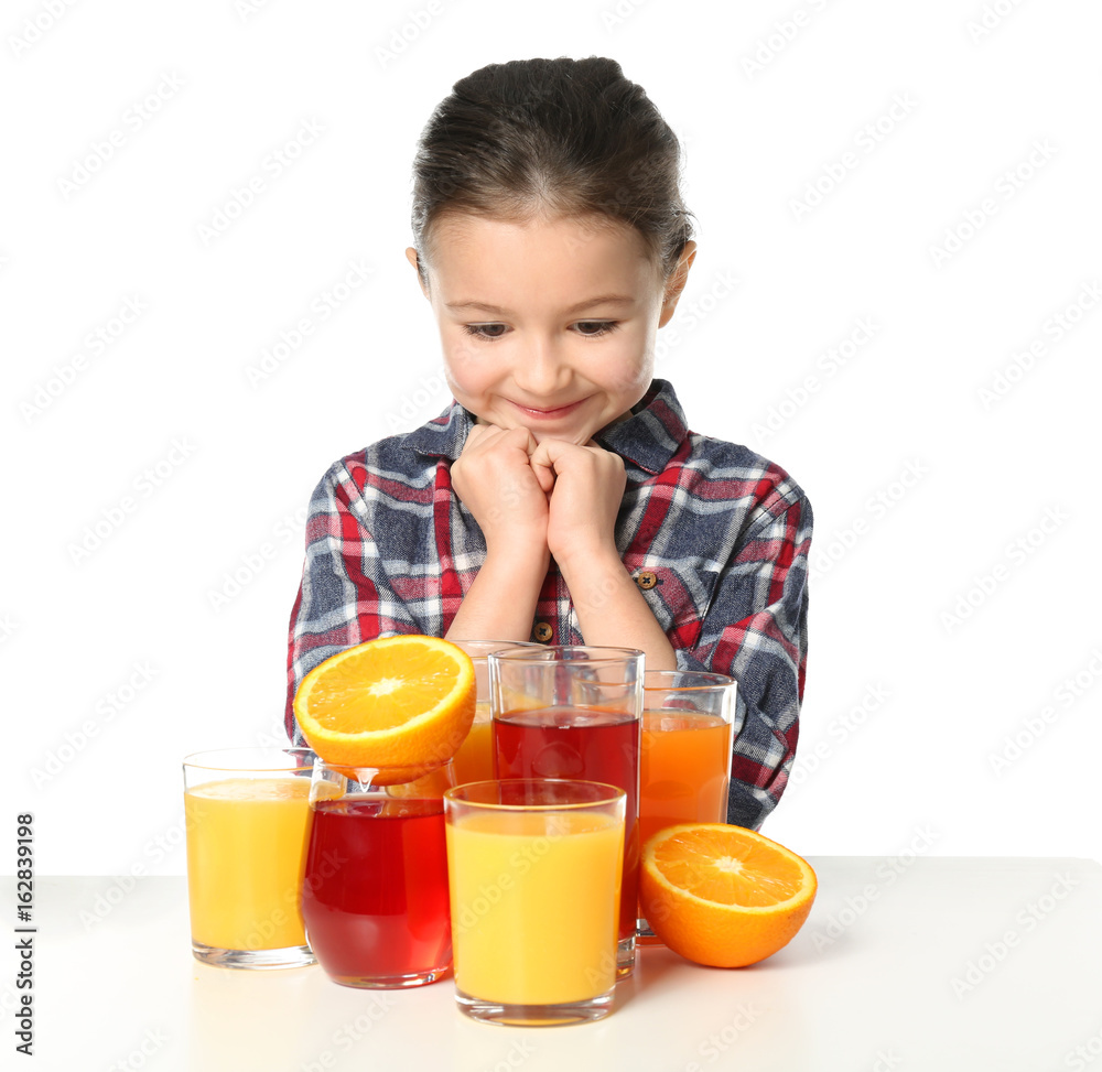 Cute little girl with glasses of different juice on white background Cute little girl with glasses of different juice on white background
