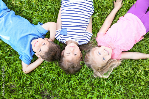 Cute little children lying ...
