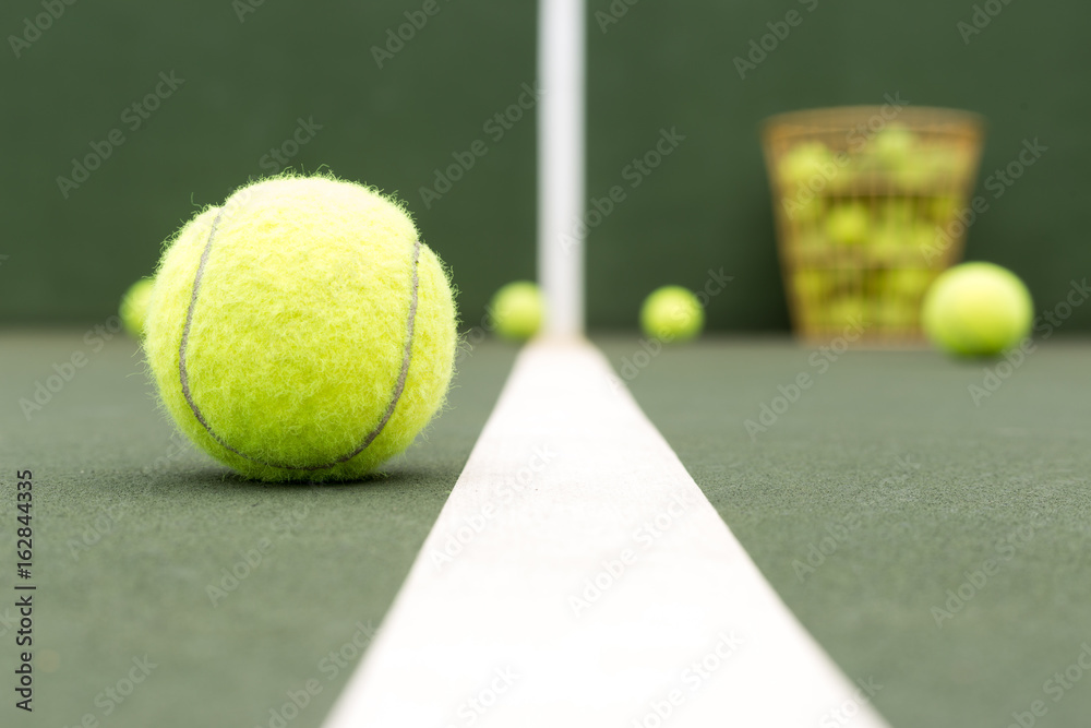 tennis ball on tennis pratice wall background