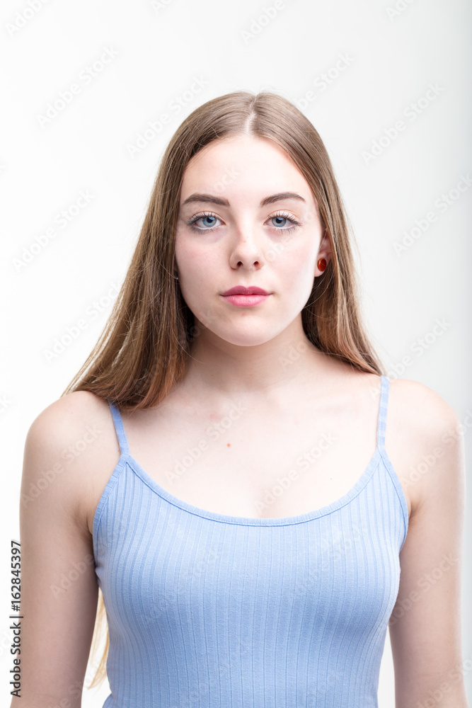 Serious young woman looking intently at camera Serious young woman looking intently at camera