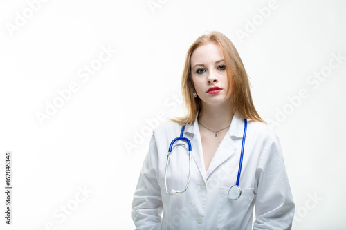 Serious young woman doctor with a pensive look