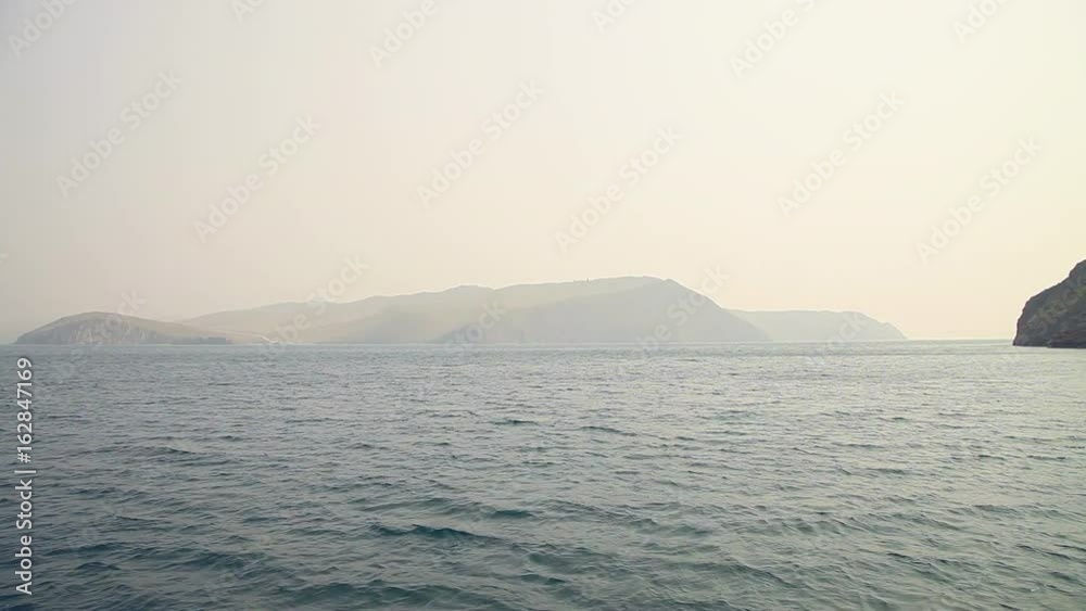 Nature of Lake Baikal. Panorama from the water Nature of Lake Baikal. Panorama from the water