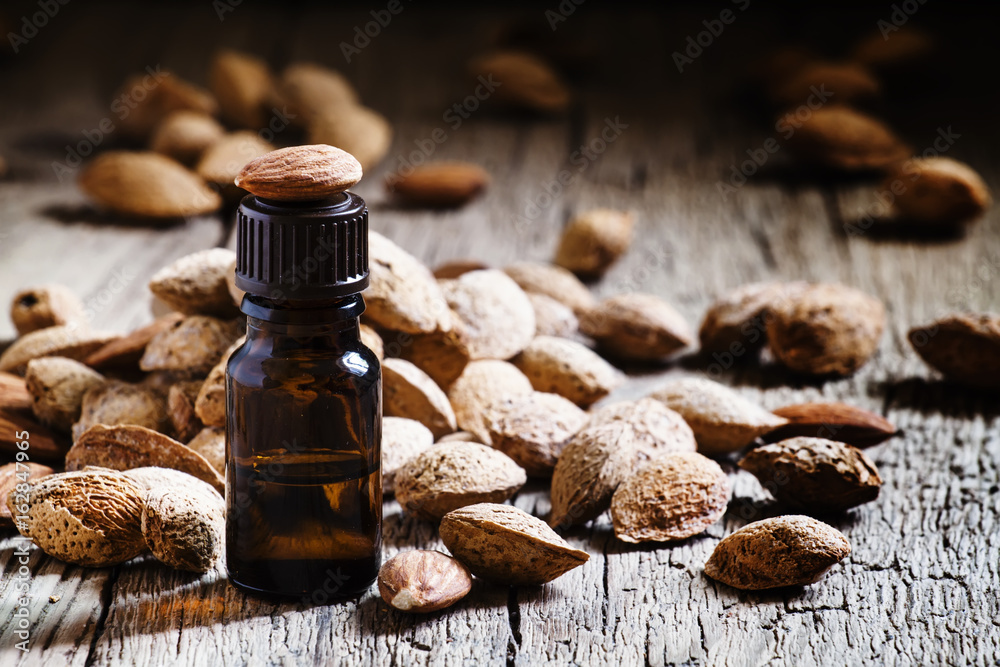 Essential almond oil, selective focus Essential almond oil, selective focus