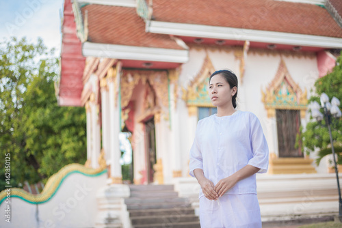 Buddhist Nuns meditation in thailand. Concept: Lent