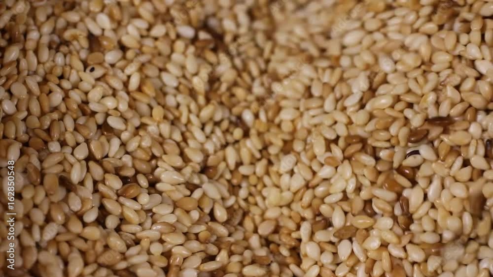 Black and white sesame seed in bamboo basket. HD Black and white sesame seed in bamboo basket. HD