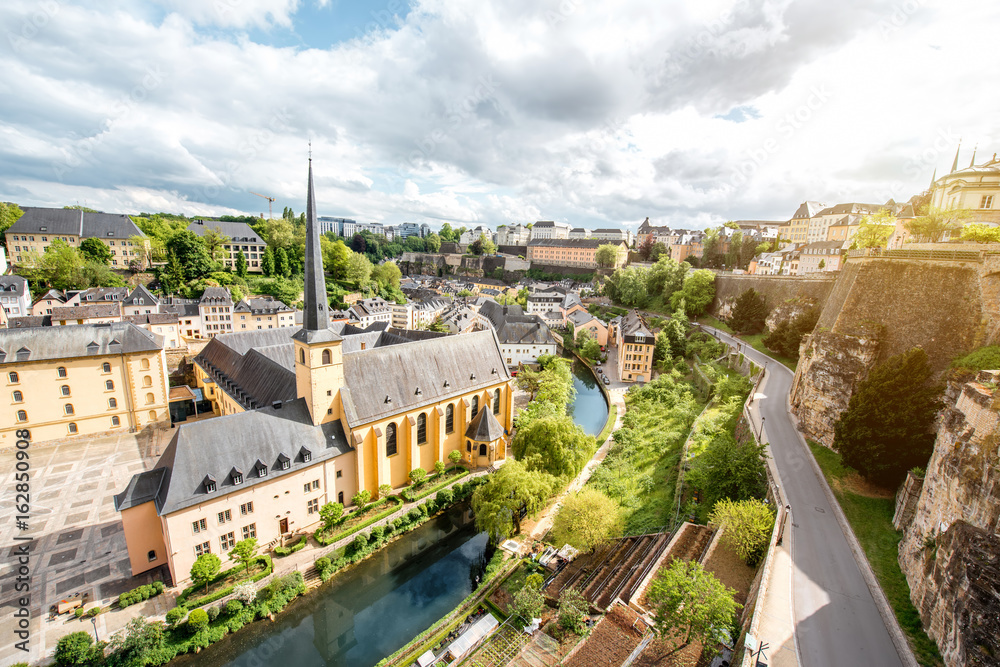 Top view on the Grund district with saint Johns church and Neumunster abbey in Luxembourg city