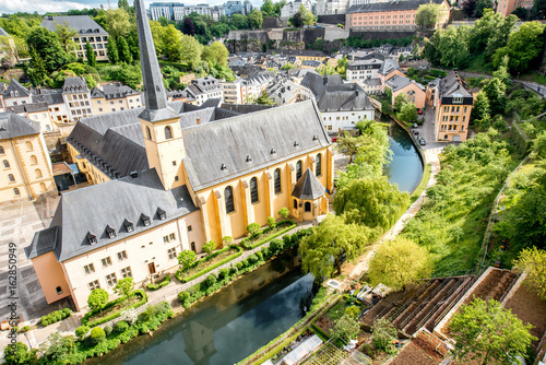 Top view on the Grund district with saint Johns church and Neumunster abbey in Luxembourg city photo