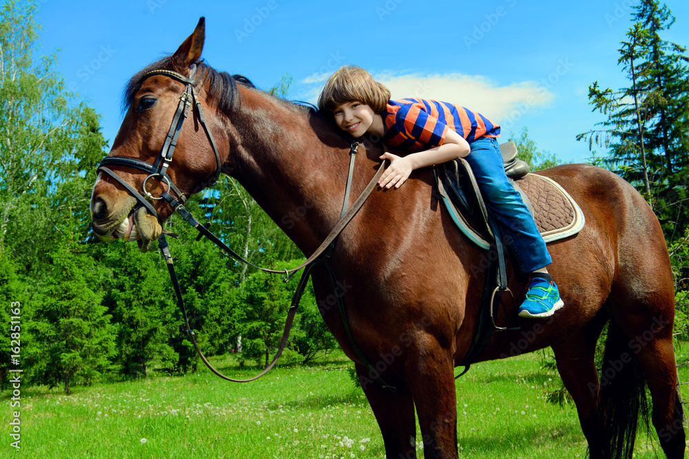 young boy rider