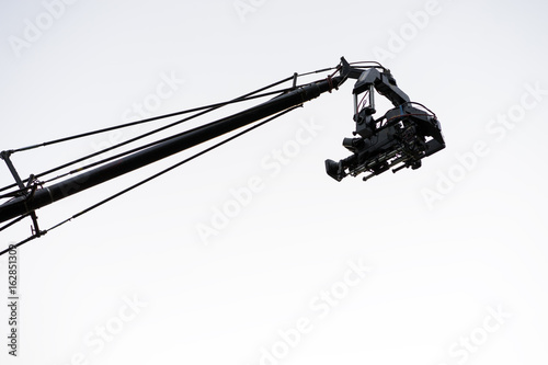 Live event video camera on crane over white