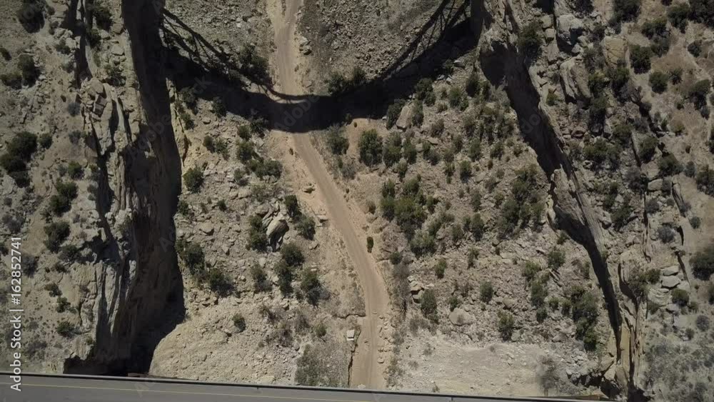 Aerial Eagle Canyon Bridge highway utah desert overhead. Geologic desert landscape. Valleys, canyons, gorges and towers. Attracts hikers and off road all terrain vehicle 4x4 recreation.