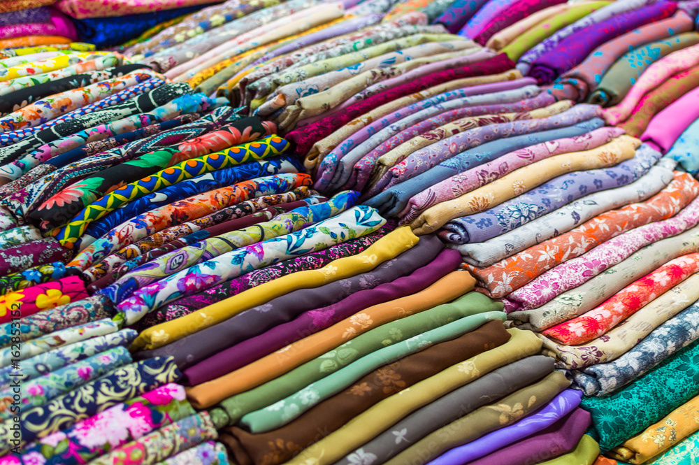 Pile of colorful fabrics and textile Pile of colorful fabrics and textile