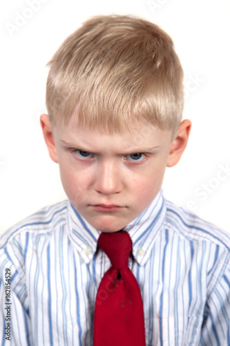 Tableau sur toile Boy child looking sad and upset.