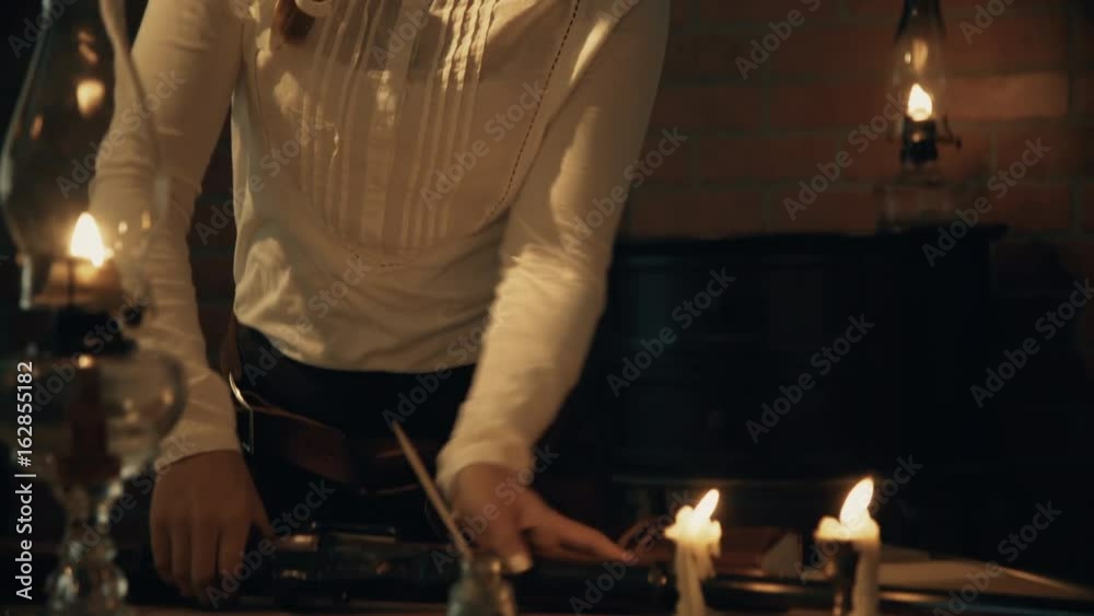 young woman from the old west picking up a rifle and walking out of the room