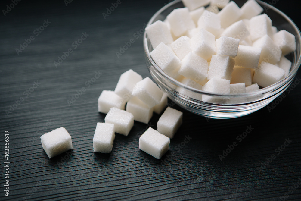 Sugar cubes on black background Sugar cubes on black background