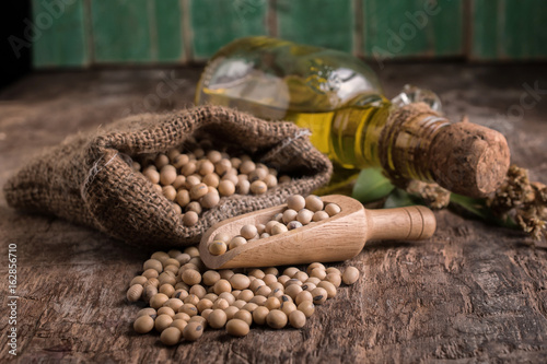 closeup is some soybeans with wooden spoon © aedkafl