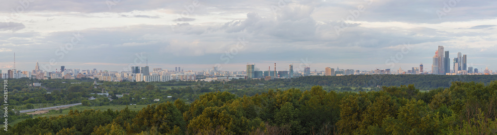 Panoramic view of Moscow from Krylatskoye District. Sunset time.