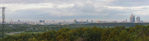 Panoramic view of Moscow from Krylatskoye District. Sunset time.