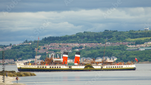 The only sea-going steam-powered paddle boat, the Waverley, filmed from Dunoon in the Firth of Clyde photo
