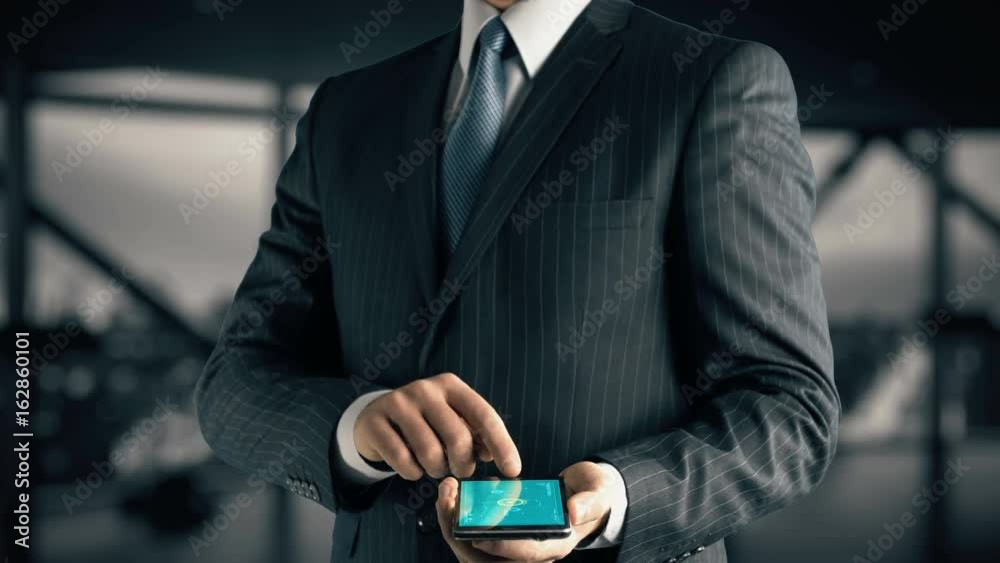Businessman with Virtual Economy hologram concept