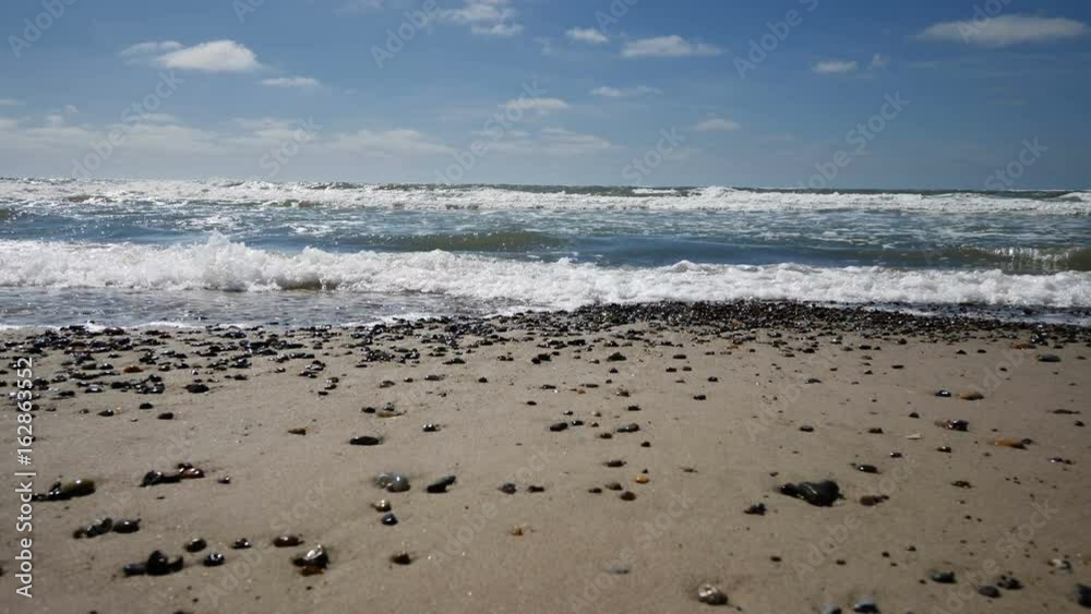 Breaking waves at a beach in 4K resolution Breaking waves at a beach in 4K resolution