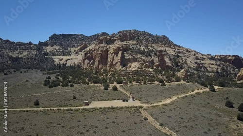 Aerial Swasey Cabin Homestead San Rafael desert mountain. Geologic desert landscape. Valleys, canyons, gorges and towers. Attracts hikers and off road all terrain vehicle 4x4 recreation. photo