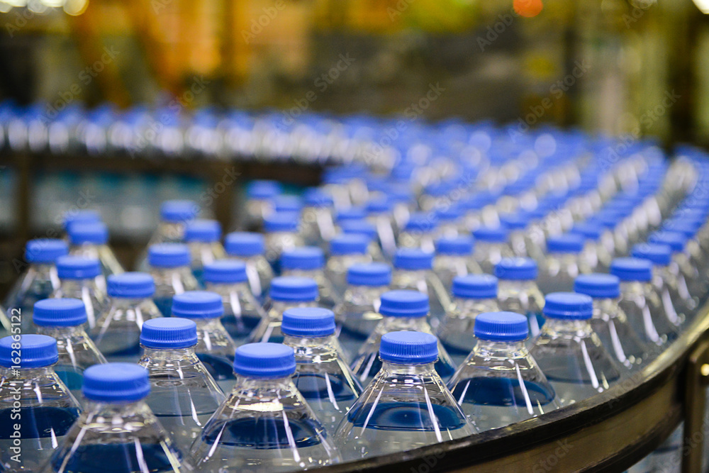 Fototapeta premium Water bottles in production line