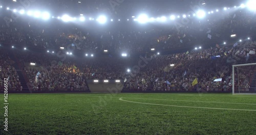 4k resolution footage of a dramatic soccer stadium. The stadium was made in 3d without using existing references. The crowd and light on the stadium are animated.