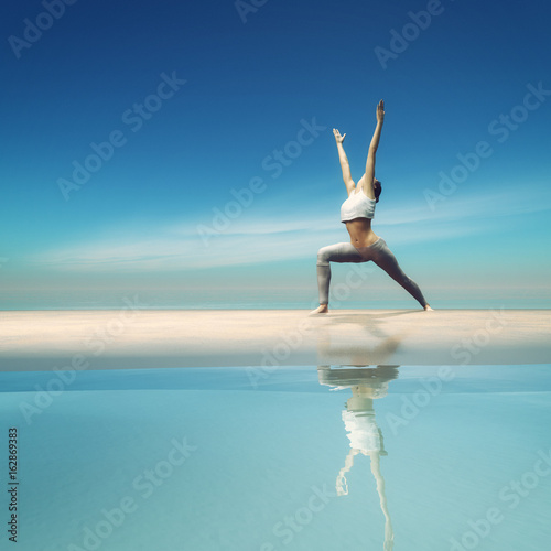 The young woman doing yoga