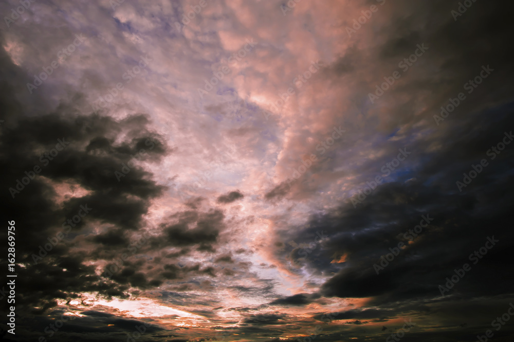 Fototapeta premium The sky is covered with black clouds at twilight