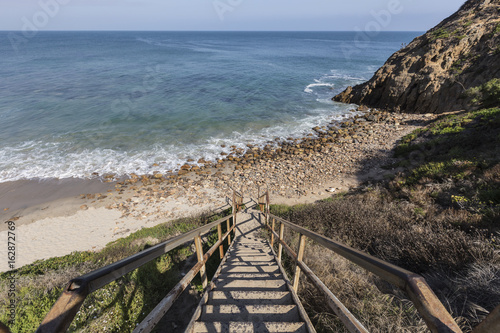 Public beach stairs at Dume Cove in Malibu, California.