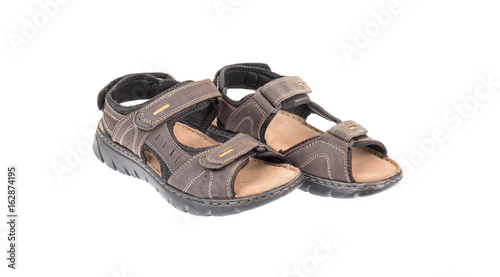 Male dark brown sandals isolated on white background.