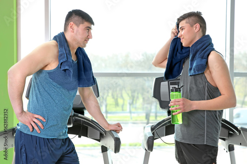 Dad and son training in mod...