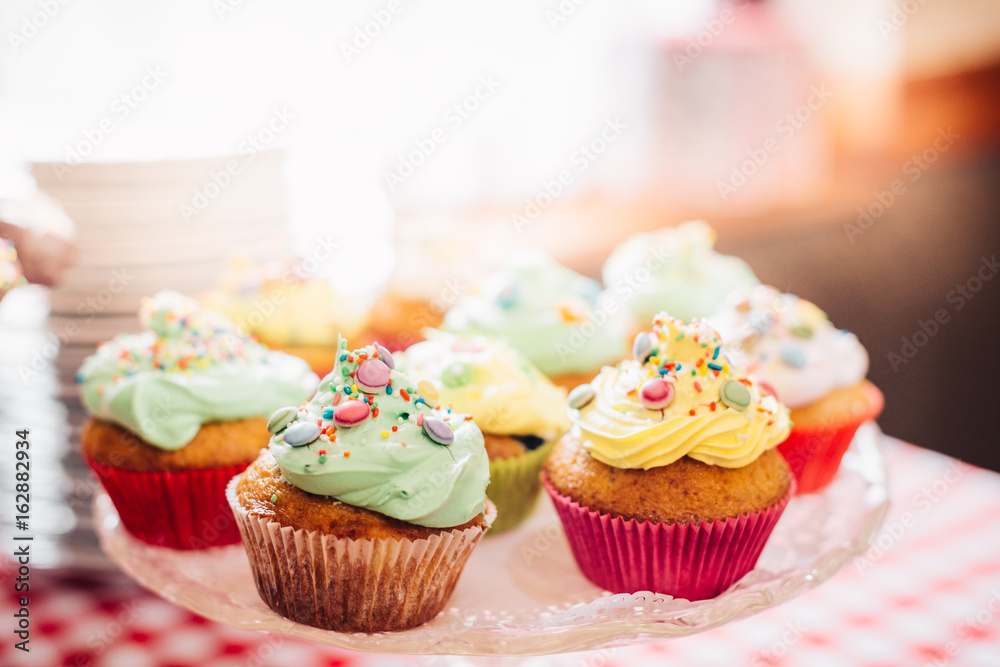 Homemade Sweets Muffins in Sweets Shop Closeup Background