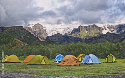 Big tourist camp is located in the valley of the park near the glacier , Iceland