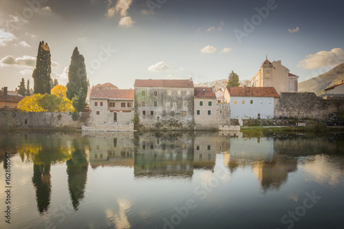 Old buildings on the banks of the river