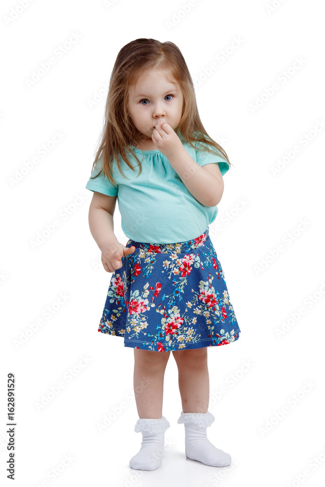 Cheerful little girl on white background isolated, vertical frame.