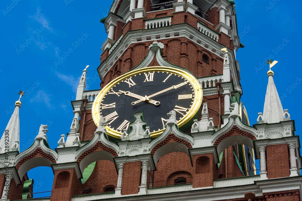 Clock on the tower close-up. Spasskaya tower of the Kremlin - chimes.