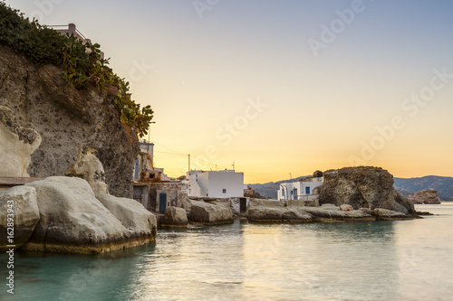 Boat houses in fishing village of Goupa on Kimolos island in Greece.

 photo