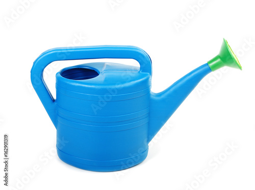 Plastic watering can isolated on a white background