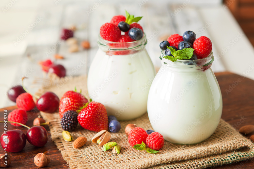 Natural yogurt with fresh berries and nuts Natural yogurt with fresh berries and nuts