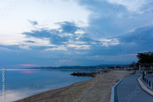 The waterfront of Nikiti in Chalkidiki, Greece, at dusk 
