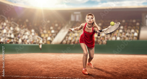 tennis player plays tennis on a court
