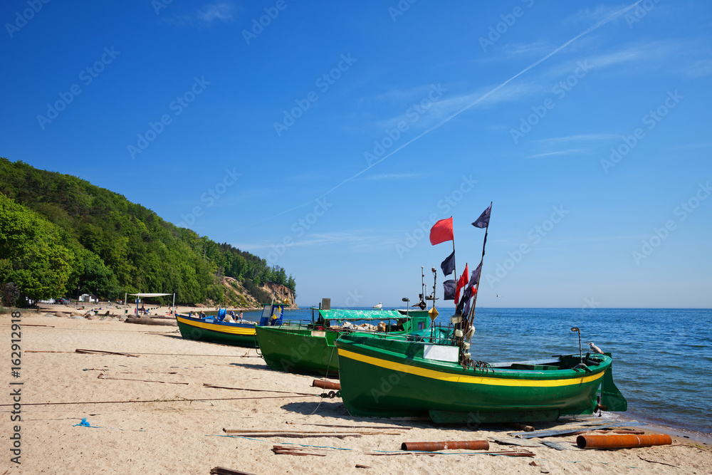 Obraz premium Baltic Sea Beach With Fishing Boats In Gdynia, Poland