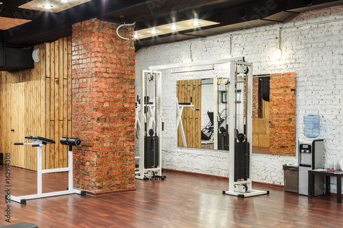 Interior view of a gym with equipment.