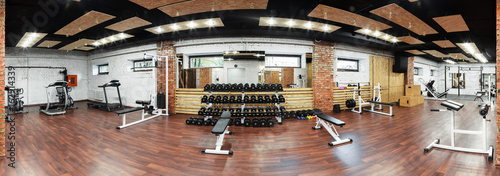 Interior view of a gym with equipment.
